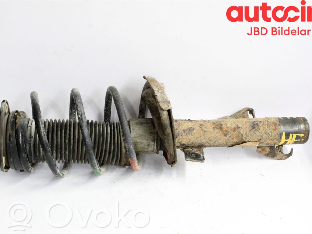 Front shock absorber with coil spring