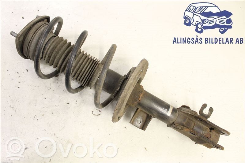 Front shock absorber with coil spring