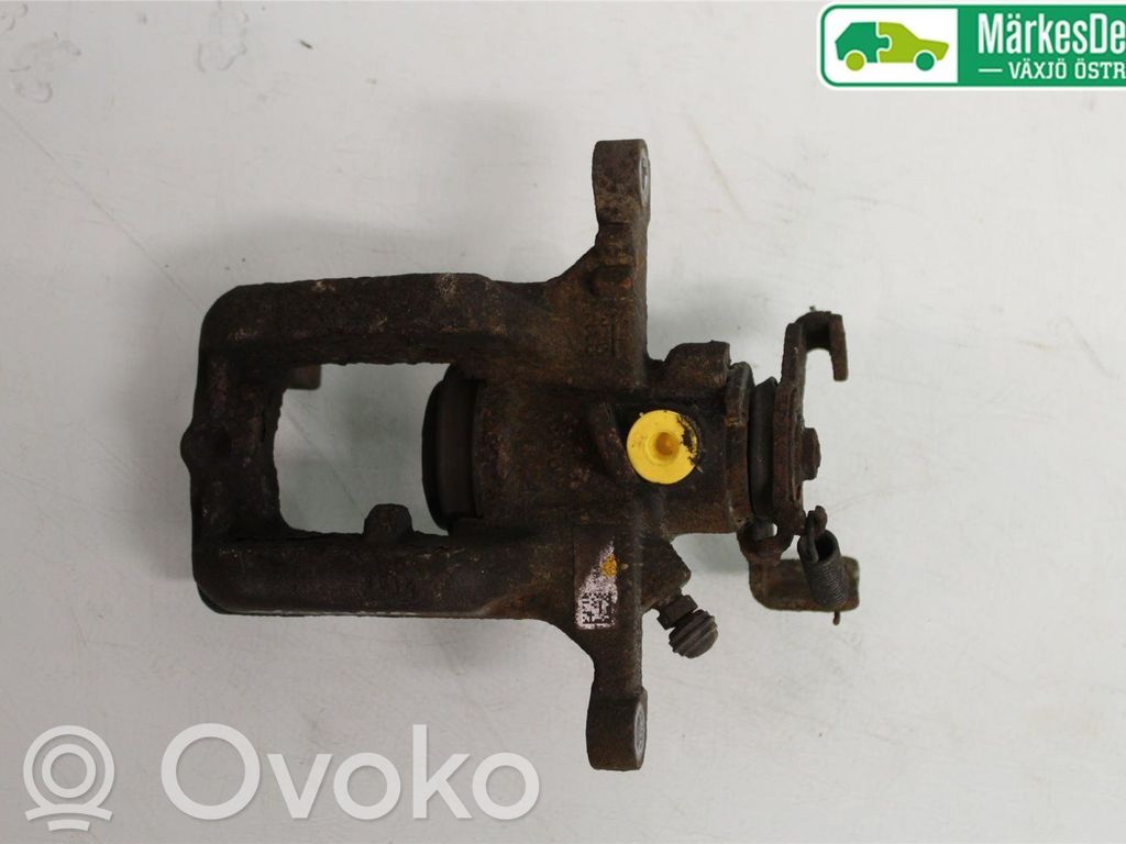 Opel Astra J Tylny zacisk hamulcowy 
