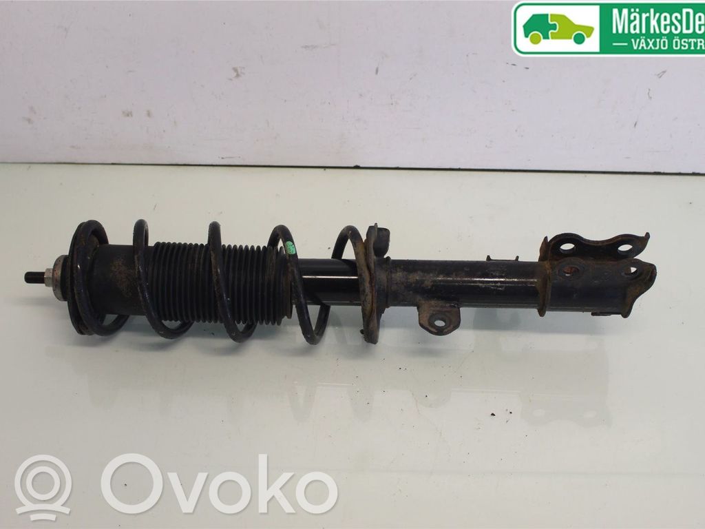 Nissan Note (E12) Front shock absorber with coil spring 