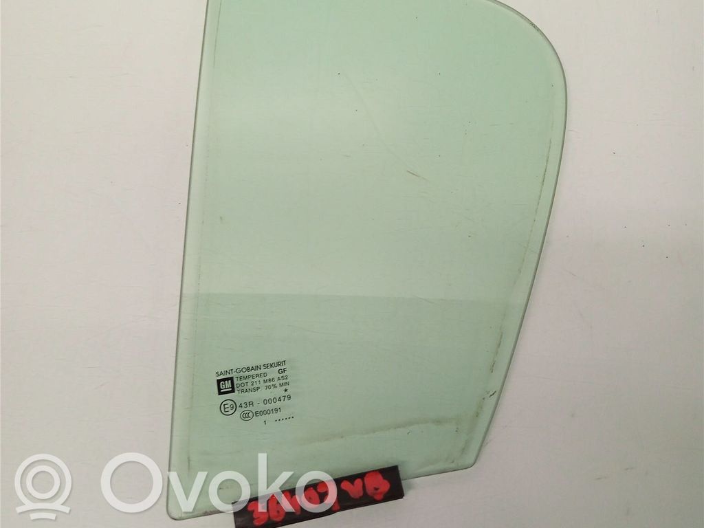 Opel Corsa D Ventanilla de ventilación de la puerta trasera 
