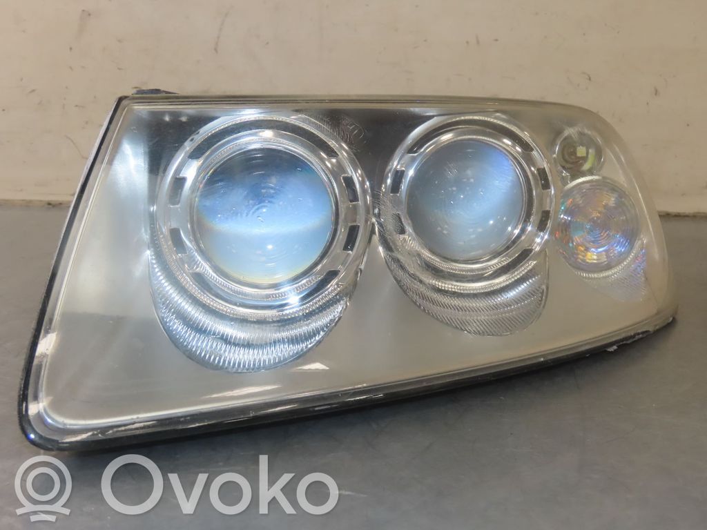 Volkswagen Touareg I Lampa przednia 