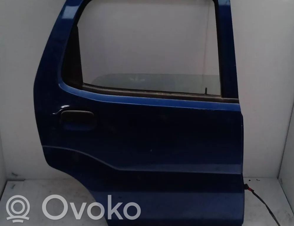 Subaru Justy Puerta trasera 