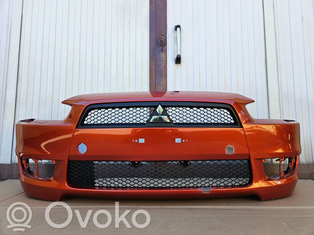 Mitsubishi Lancer VIII Parachoques delantero 