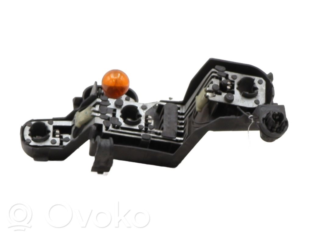Tail light bulb cover holder