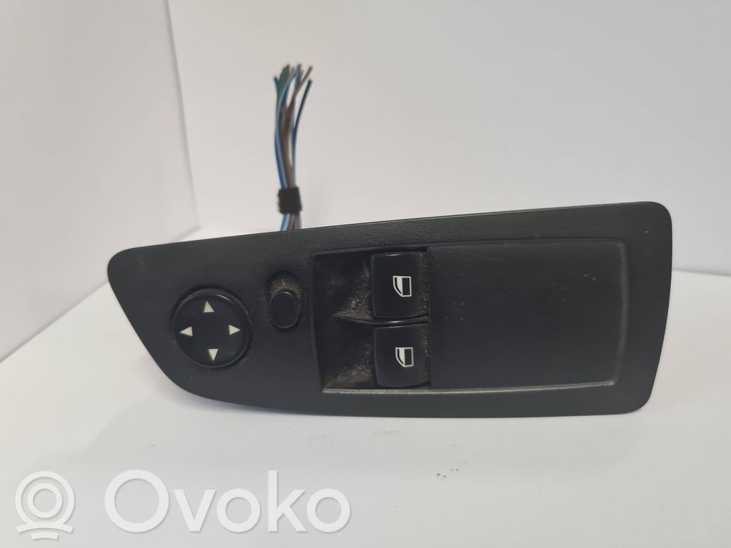Electric window control switch   6970191