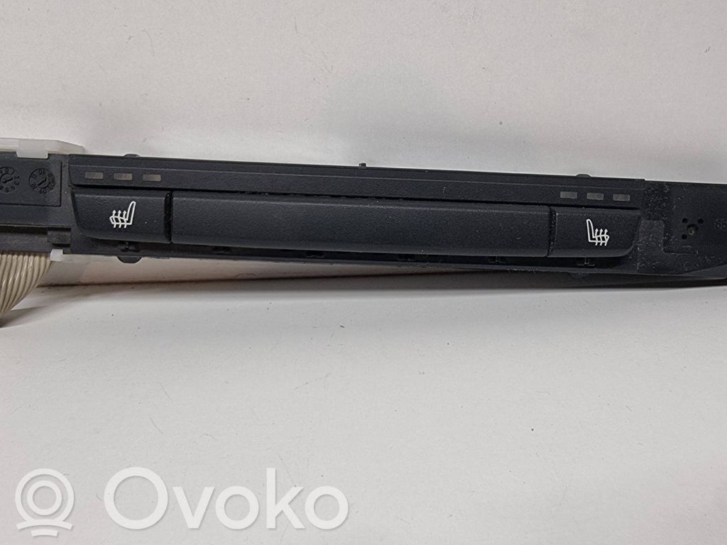 Seat heating switch   6962589,03743650