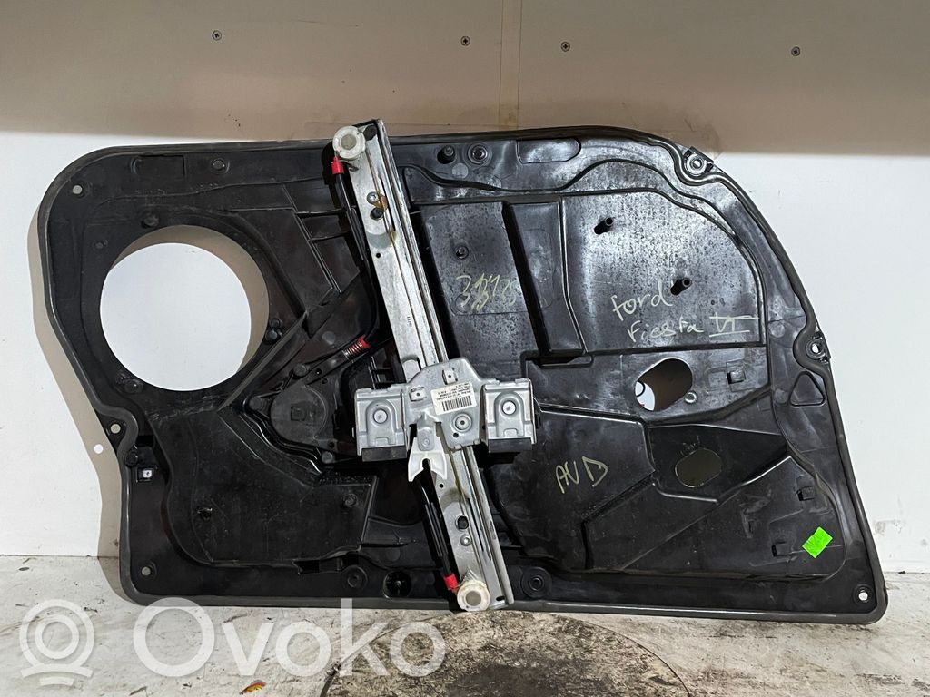 Ford Fiesta I Manualny podnośnik szyby drzwi przednich 