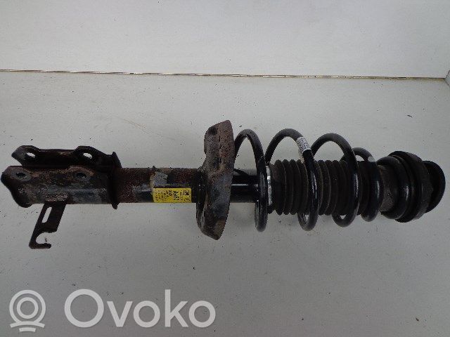 Opel Astra J Amortyzator osi przedniej ze sprężyną 