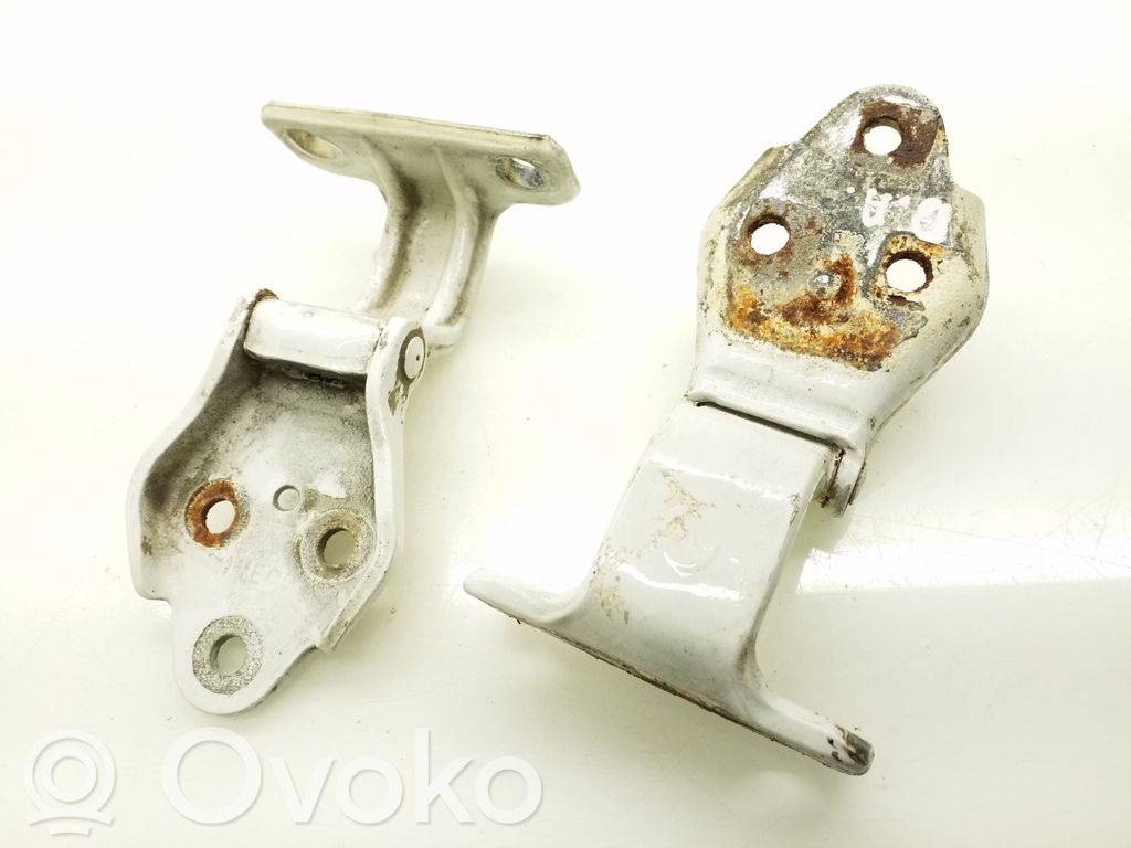 Front door hinge set