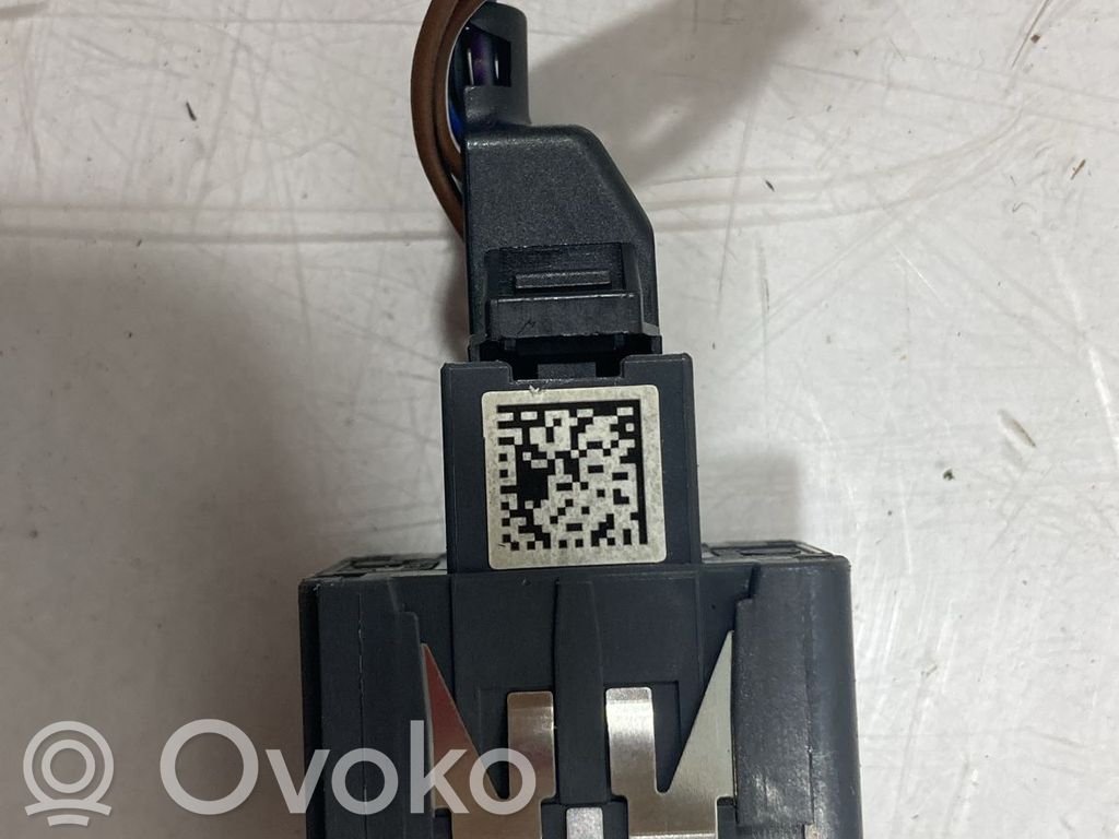 Volkswagen PASSAT B7 Interruptor de control de altura del faro delantero 