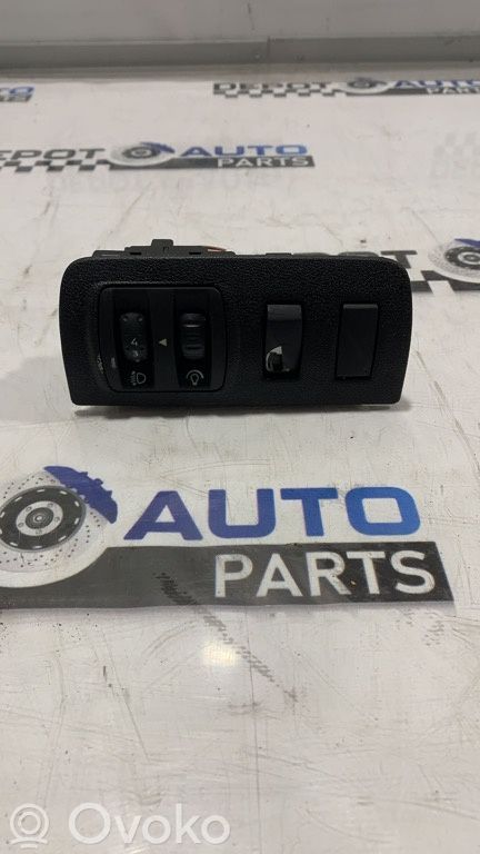 Renault Megane III Interruptor de control de altura del faro delantero 