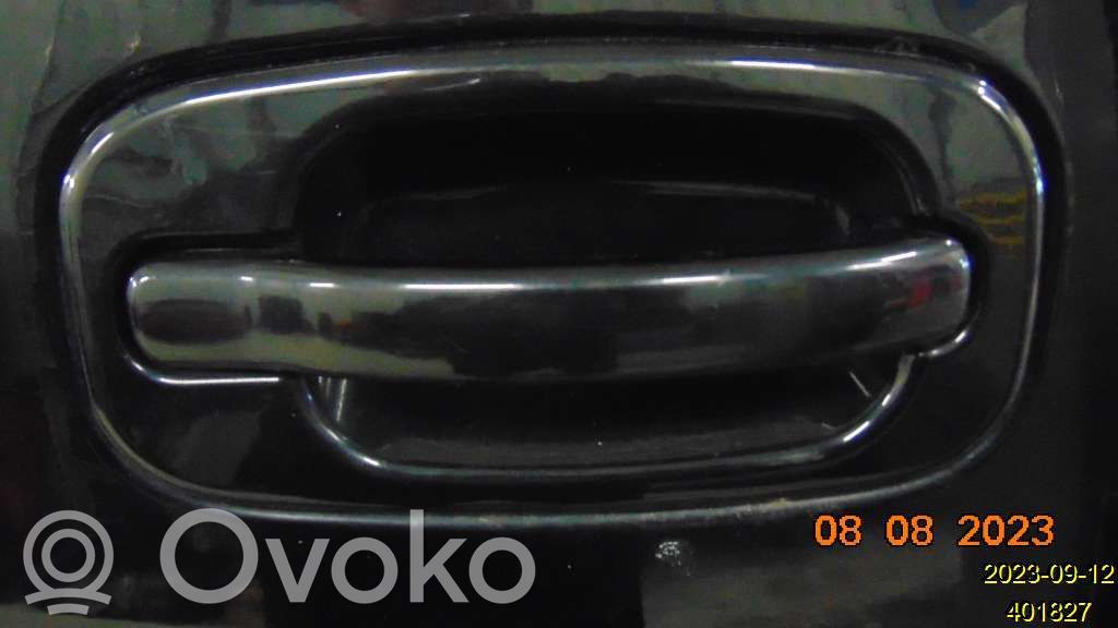Chevrolet Tahoe Manecilla externa puerta delantera 