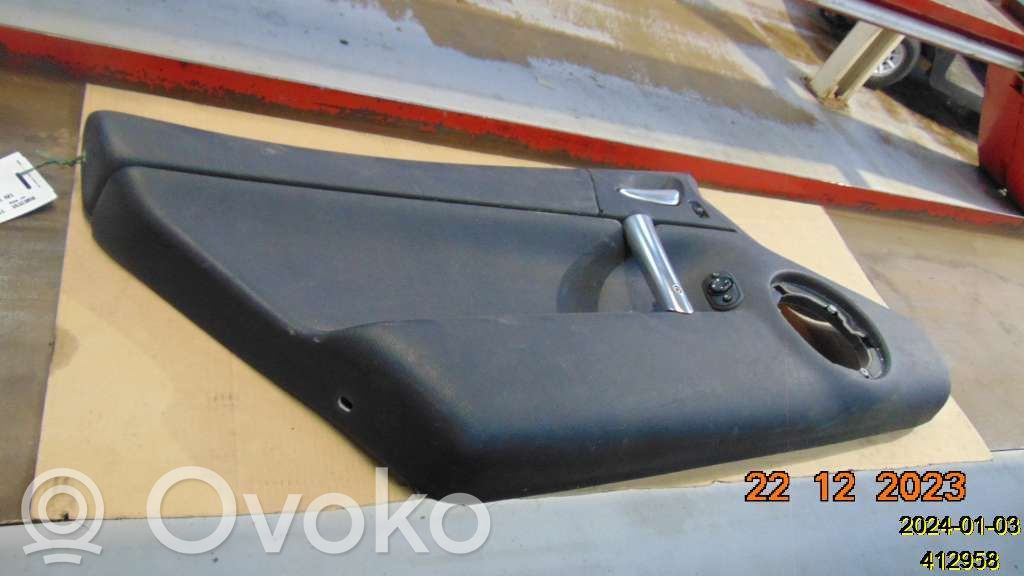 Front door card panel trim