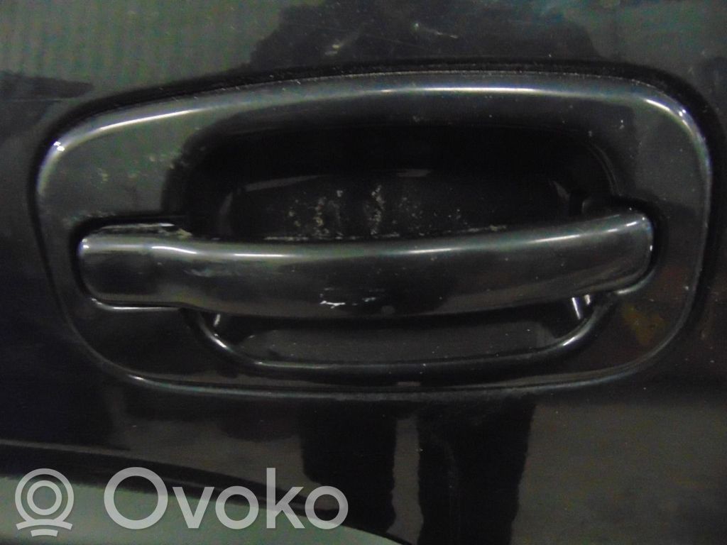 Chevrolet Tahoe Manecilla externa puerta delantera 