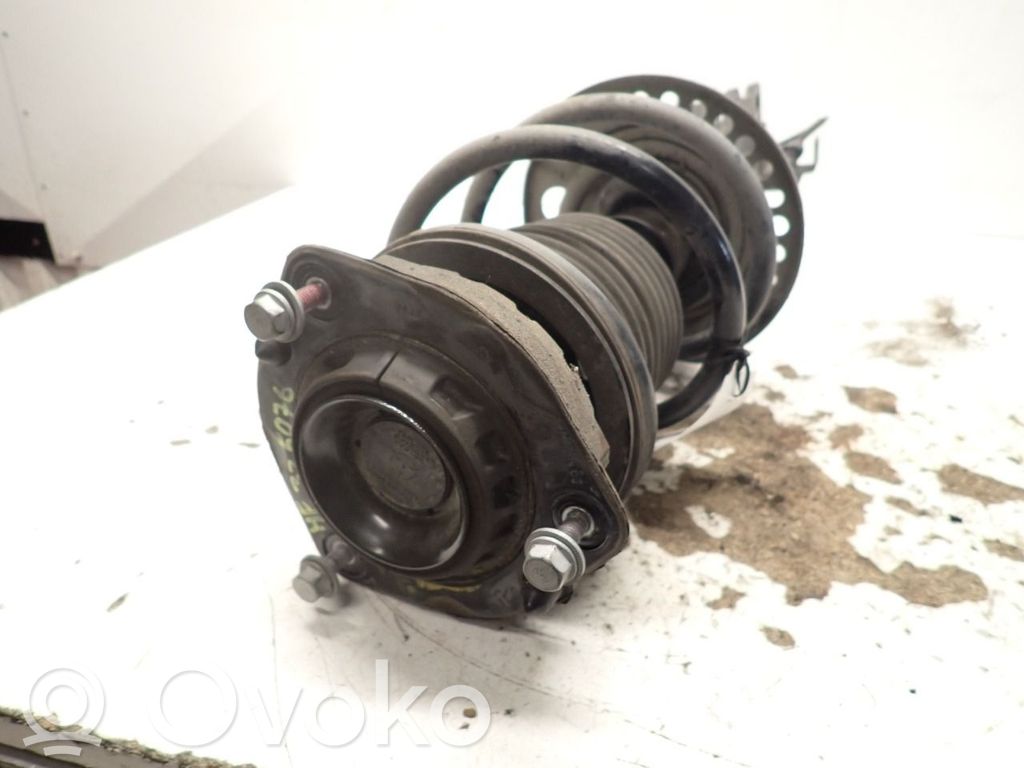 Amortiguador delantero con muelle espiral   85649815,52702259R
