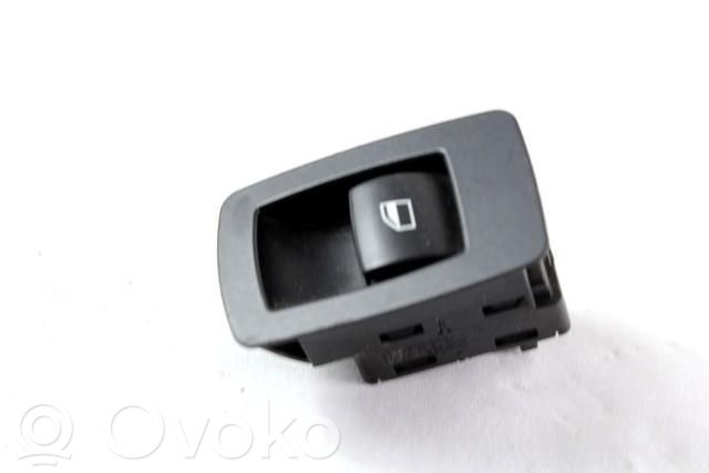 Electric window control switch   6945874
