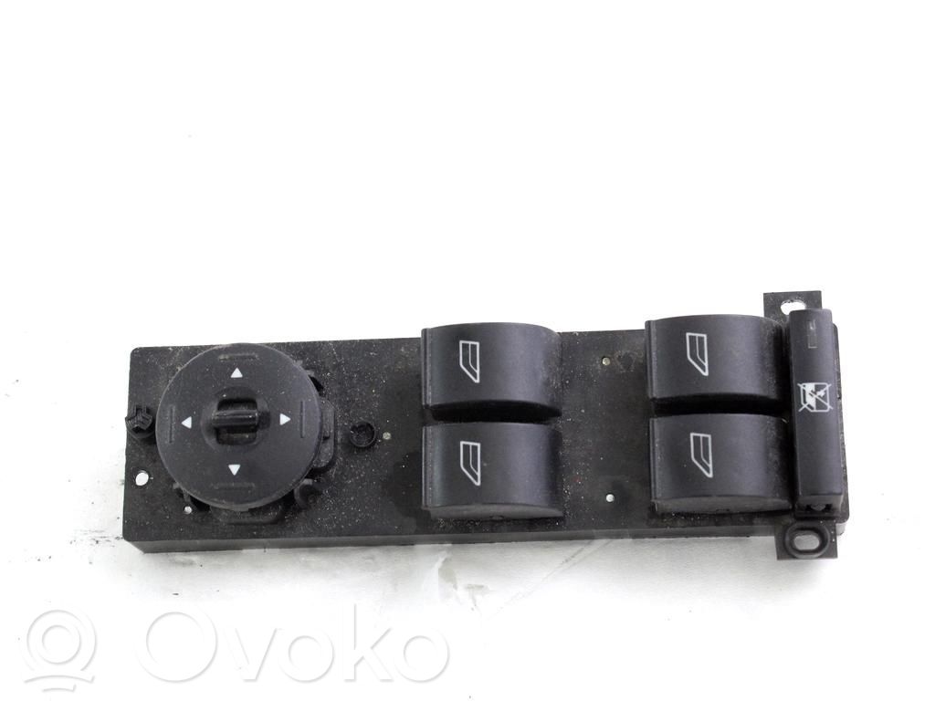 Electric window control switch   7M5T14A132AB