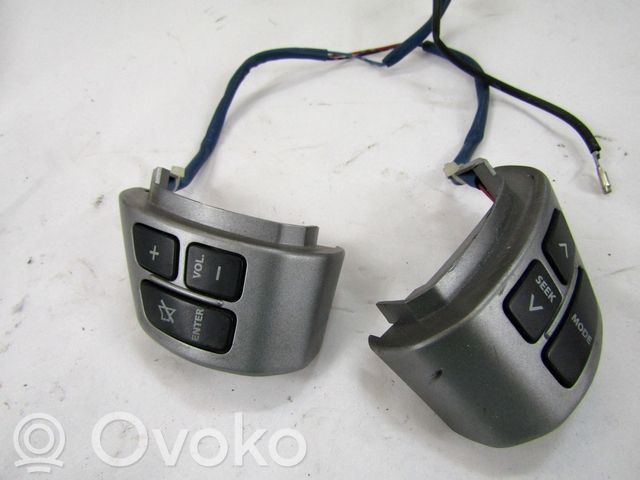 Suzuki Swift I Pulsanti/interruttori sul volante 