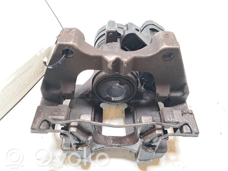 Seat Leon (5F) Zacisk hamulcowy przedni 