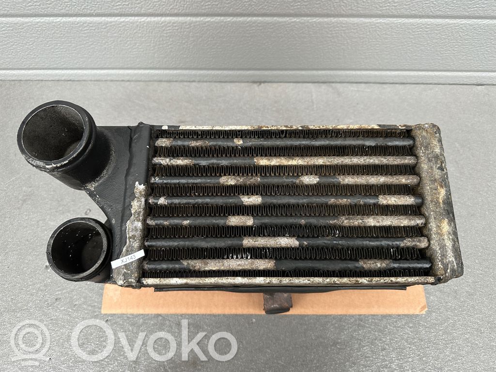 Jeep Cherokee XJ Chłodnica powietrza doładowującego / Intercooler 