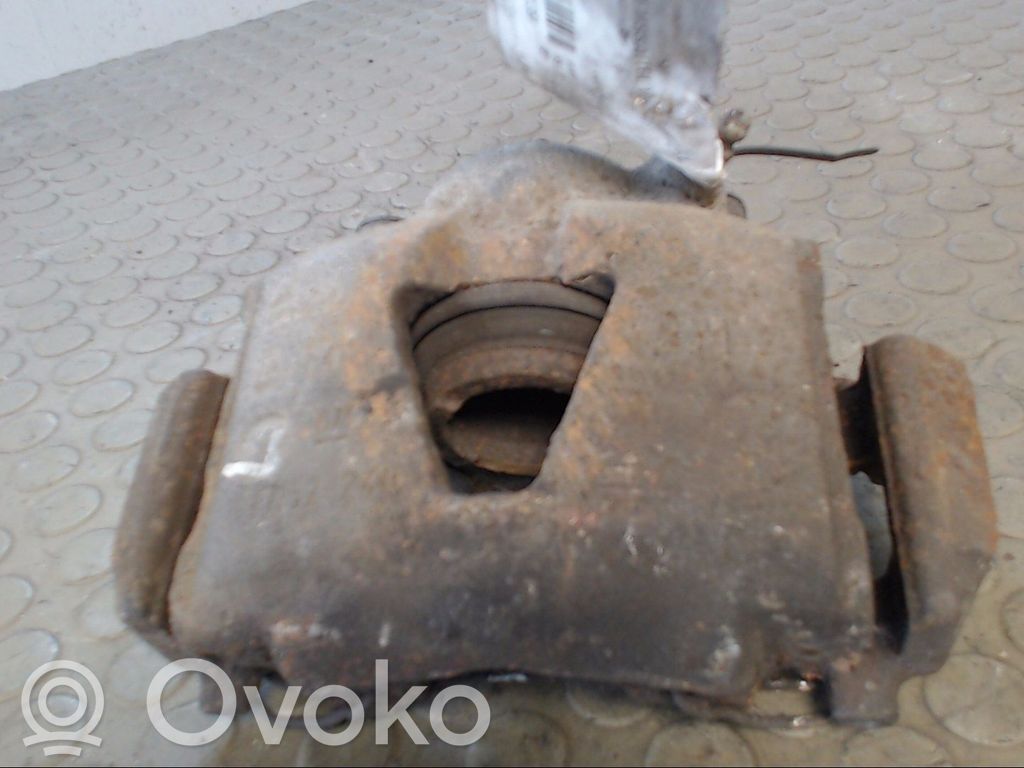 Opel Astra F Zacisk hamulcowy przedni 