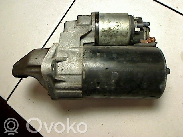 Opel Corsa D Стартер 