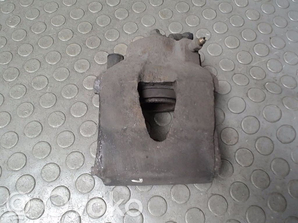 Volkswagen Golf IV Zacisk hamulcowy przedni