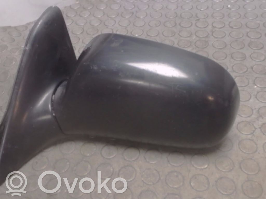 Toyota Corolla E80 Espejo lateral manual 