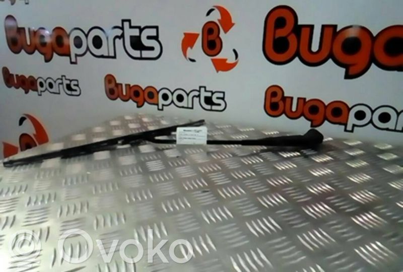 Front wiper blade arm