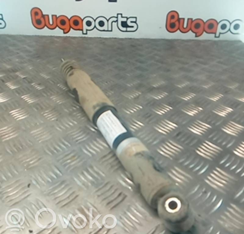 Opel Corsa B Aizmugurē amortizators 