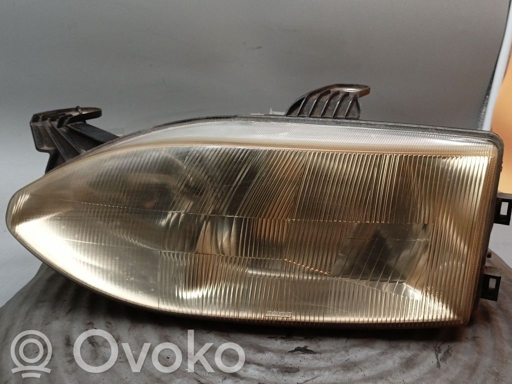 Headlight/headlamp   46537112,38554999,CARELLO