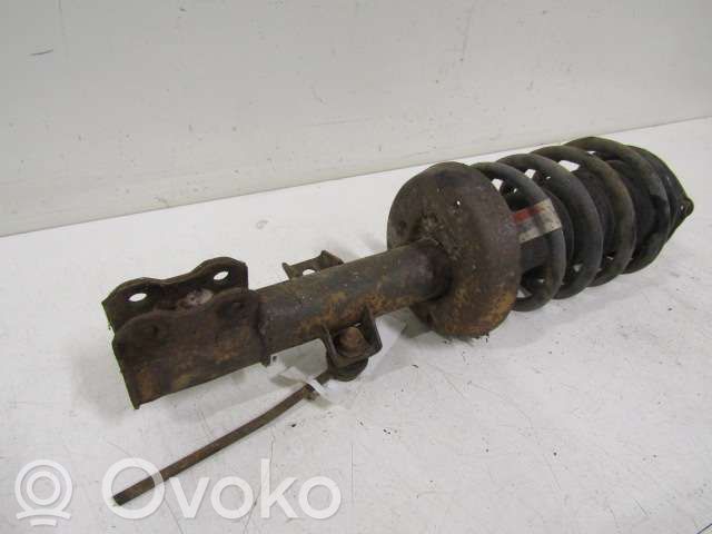 Front shock absorber with coil spring