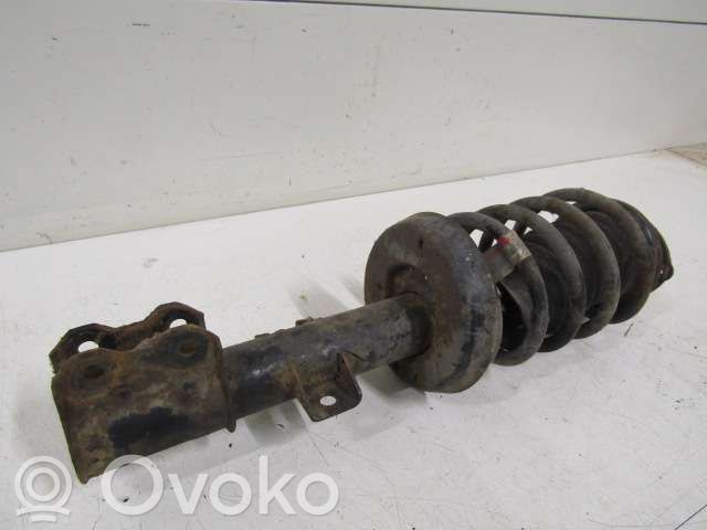 Front shock absorber with coil spring