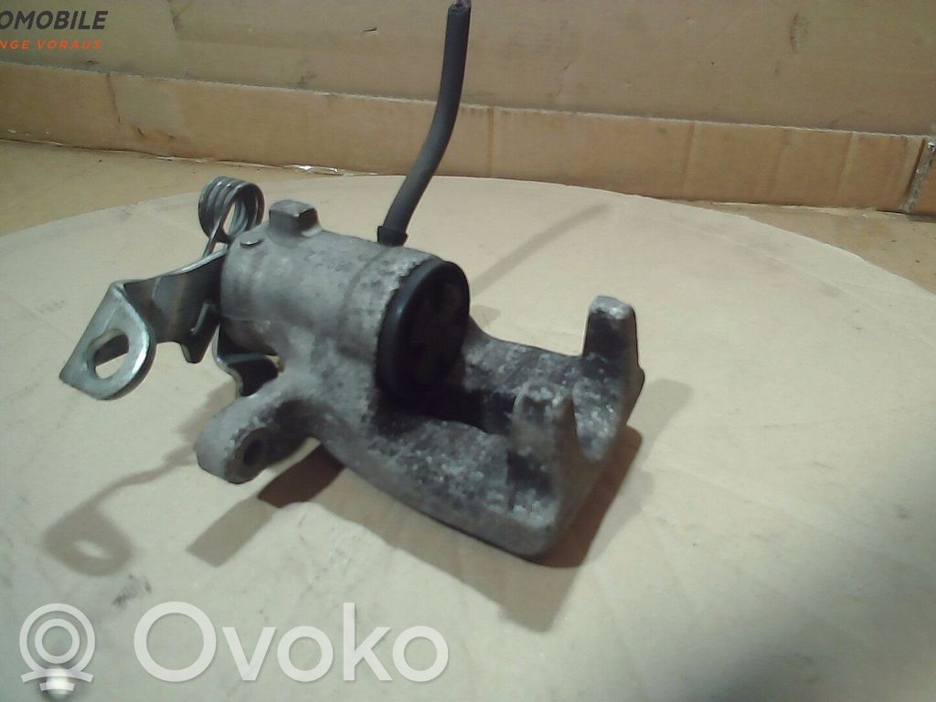 Opel Astra G Tylny zacisk hamulcowy 