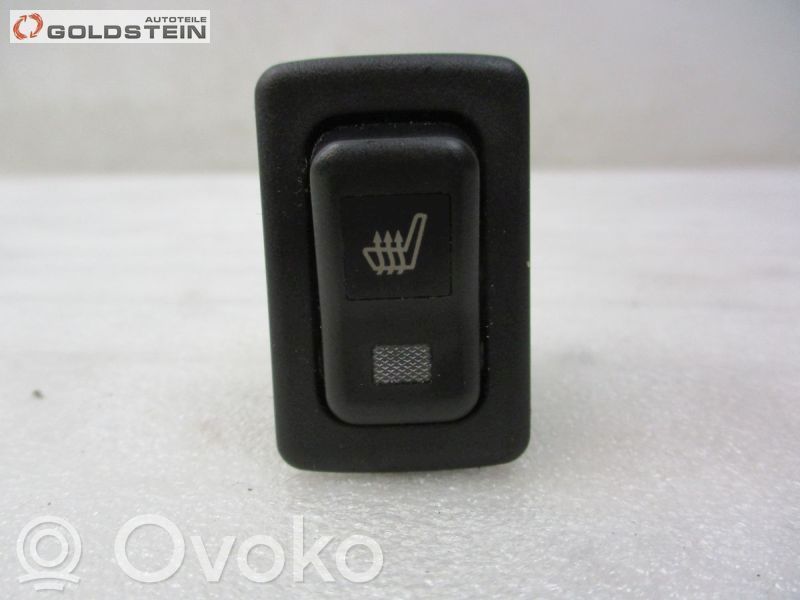 Seat heating switch