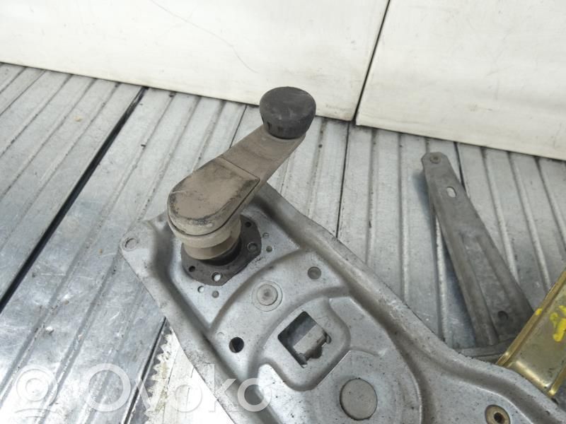 BMW 5 E34 Regulador manual de la ventanilla trasera 