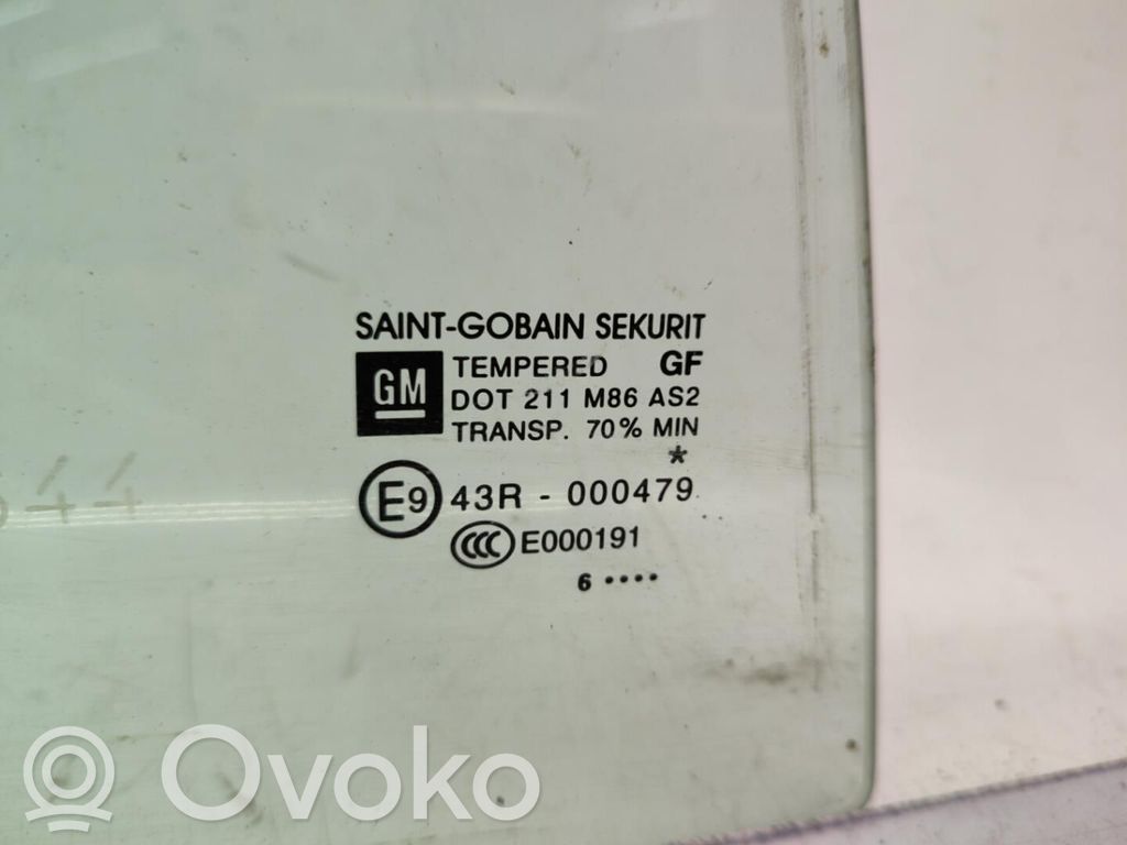 Opel Corsa D Ventanilla de ventilación de la puerta trasera 