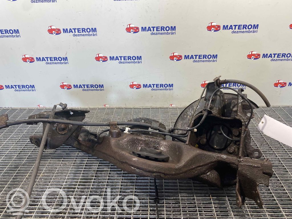 Nissan Qashqai+2 Olka-akselin laakeripesä 