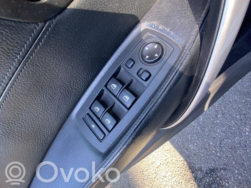 BMW X3 E83 Elektrisko logu slēdzis 