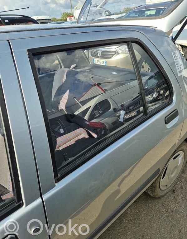 Renault Clio I Luna de la puerta trasera 