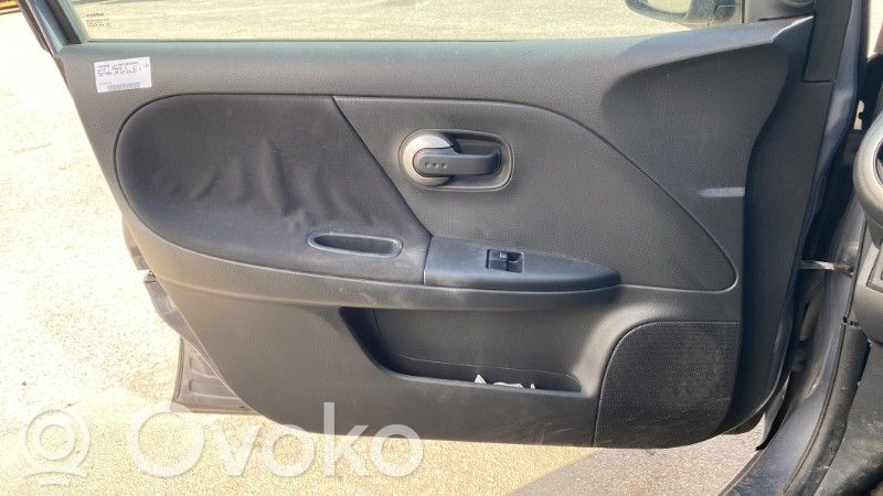Nissan Note (E11) Panou tapițerie ușă față 