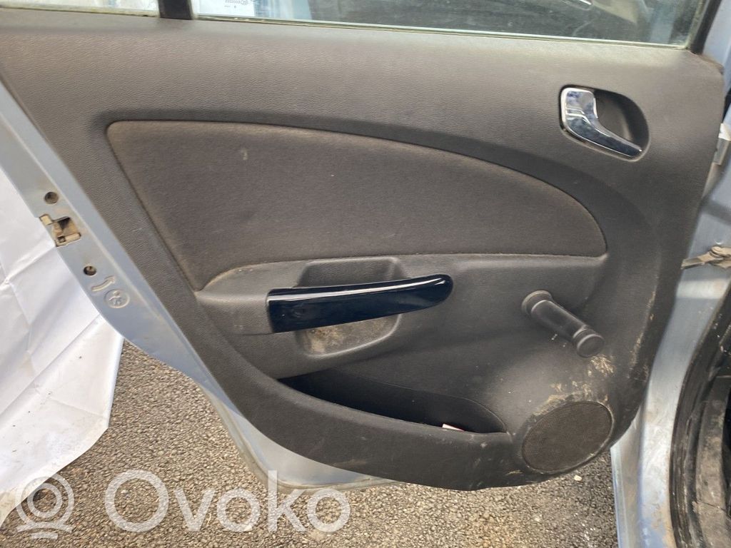 Opel Corsa D Moldura del tarjetero de la puerta trasera 