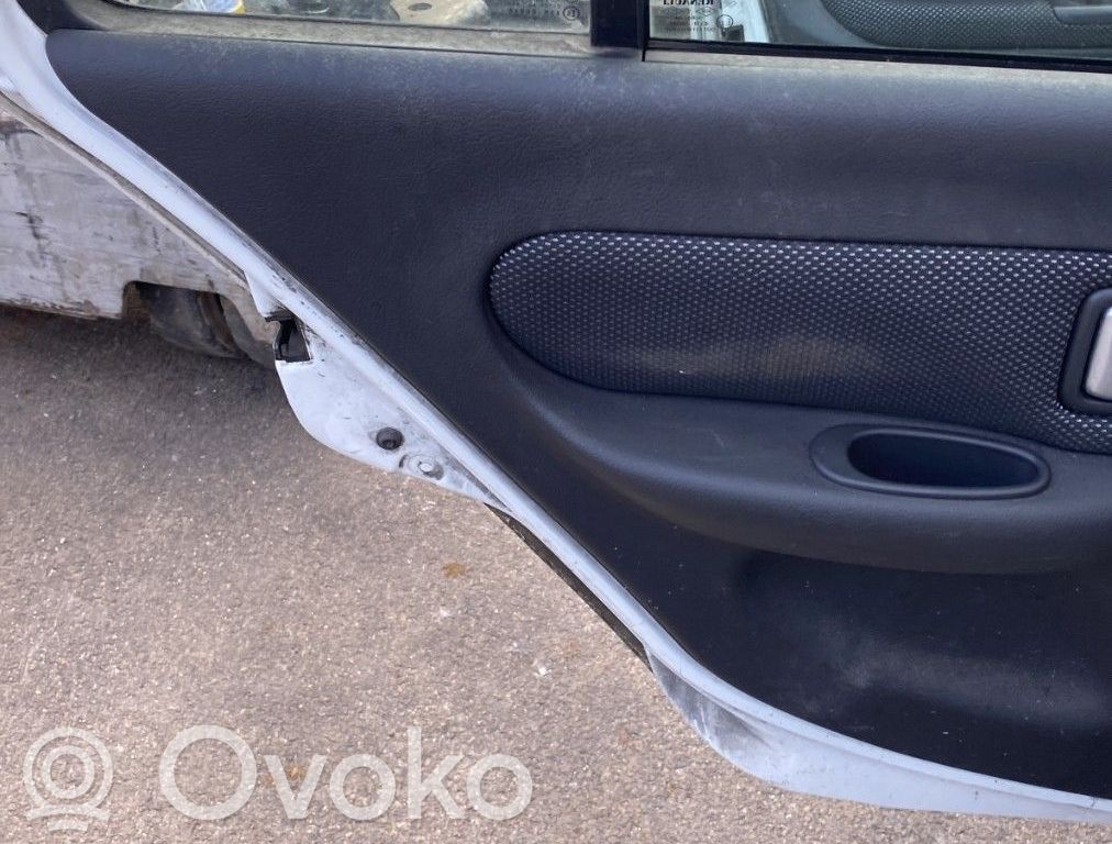 Renault Clio II Apmušimas galinių durų (obšifke) 