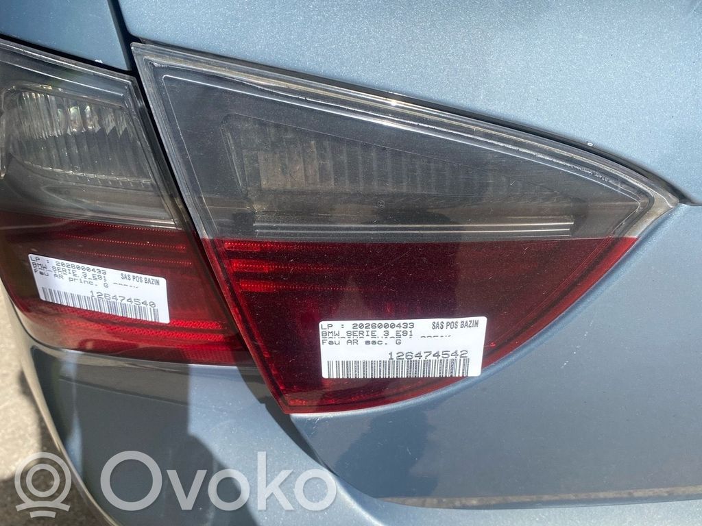 BMW 3 E90 E91 Aizmugurējais lukturis pārsegā 