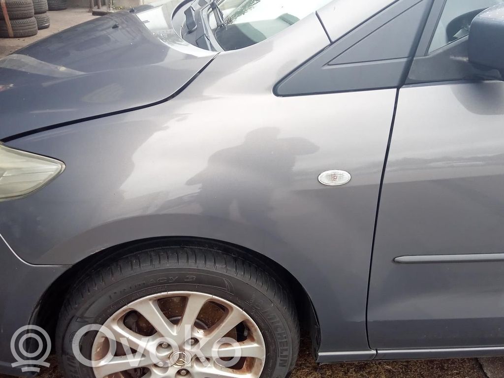 Mazda 5 Spārns 