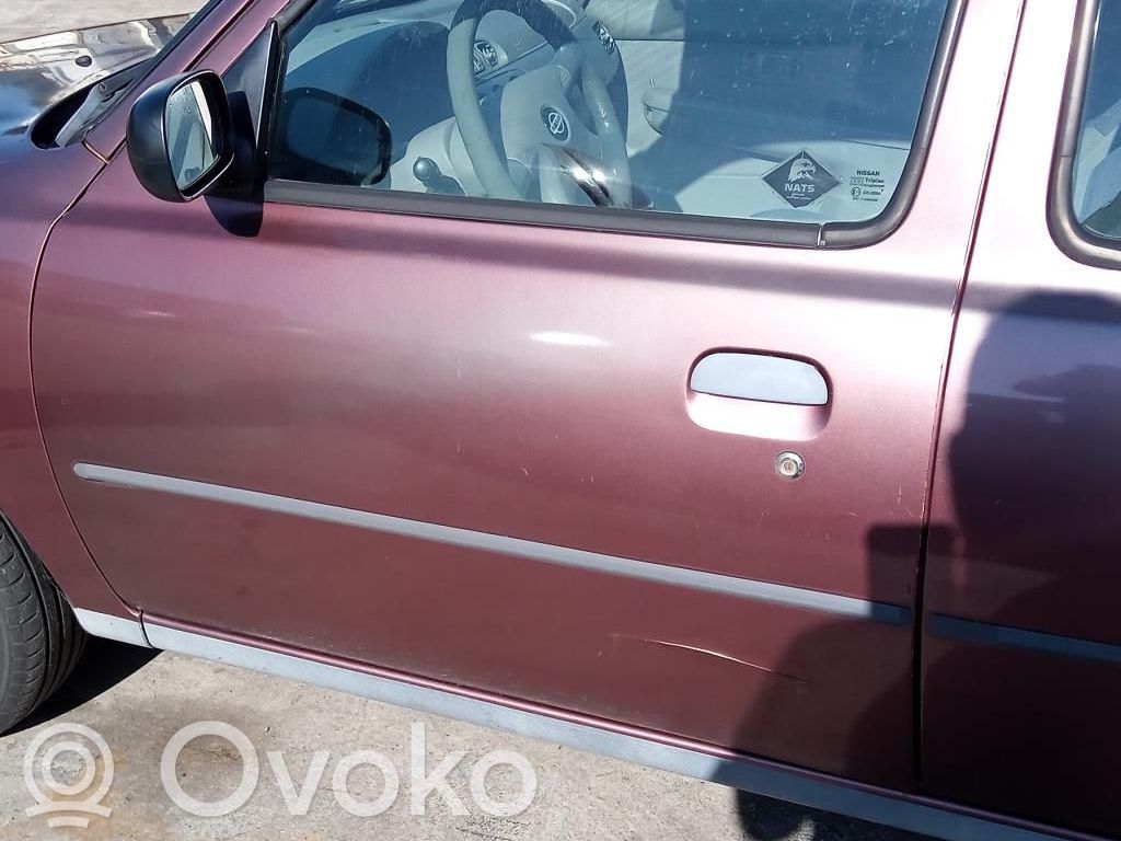 Nissan Micra Elektryczny podnośnik szyby drzwi przednich 