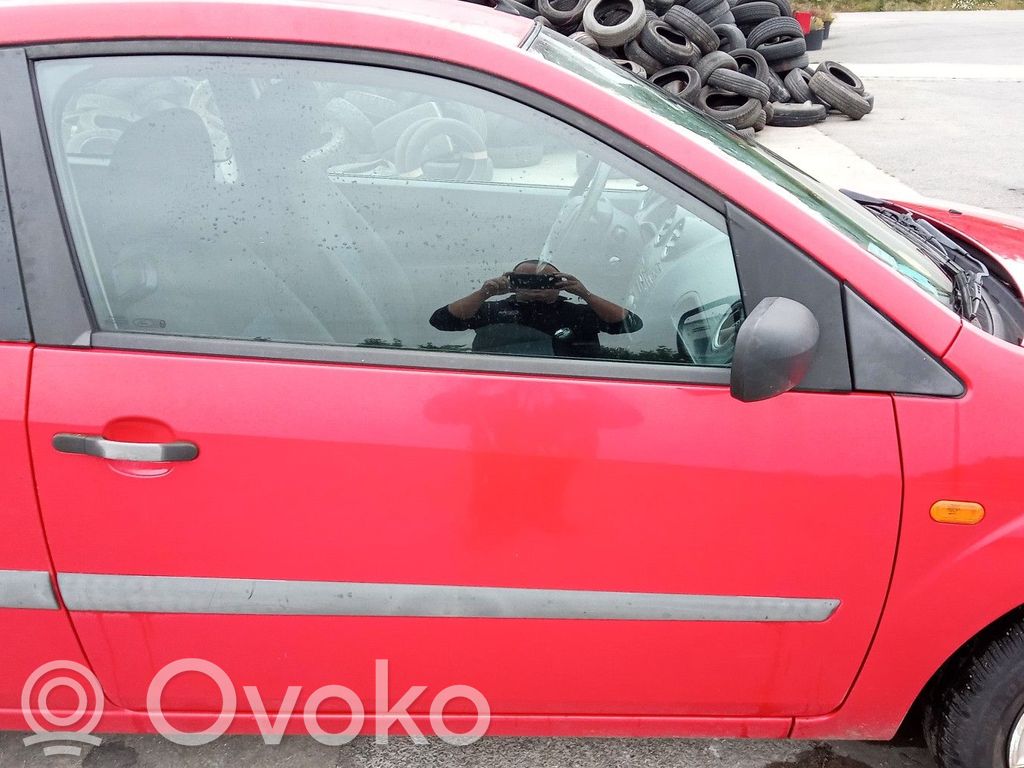 Ford Fiesta Elektryczny podnośnik szyby drzwi przednich 