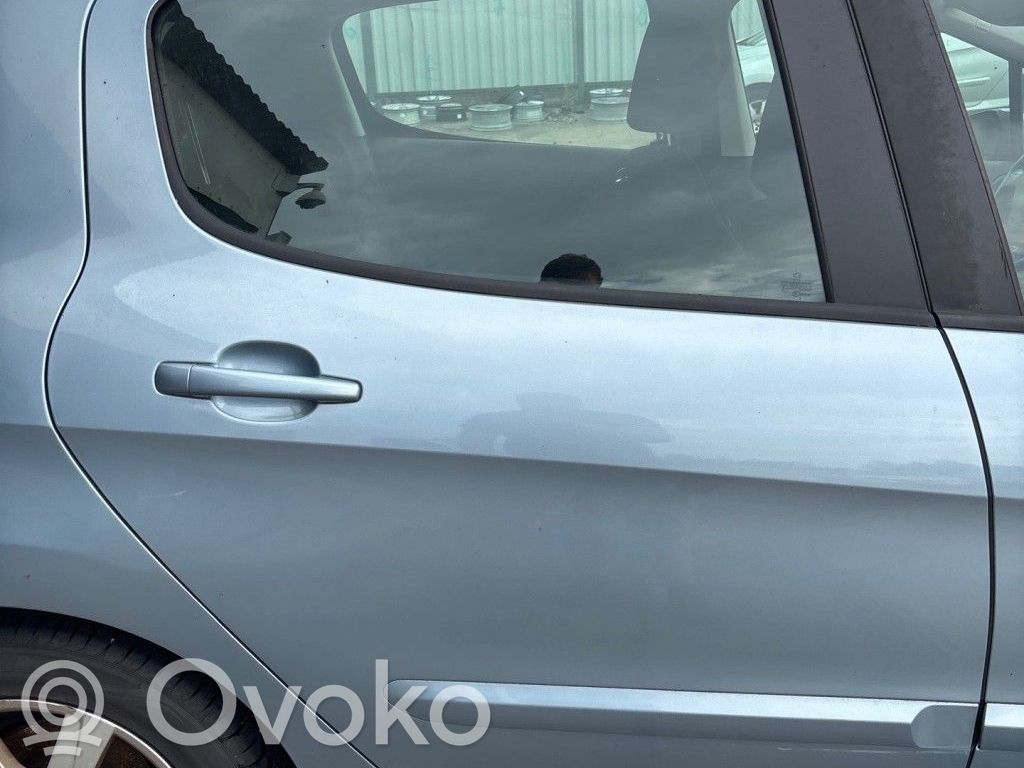 Peugeot 308 Szyba drzwi tylnych 