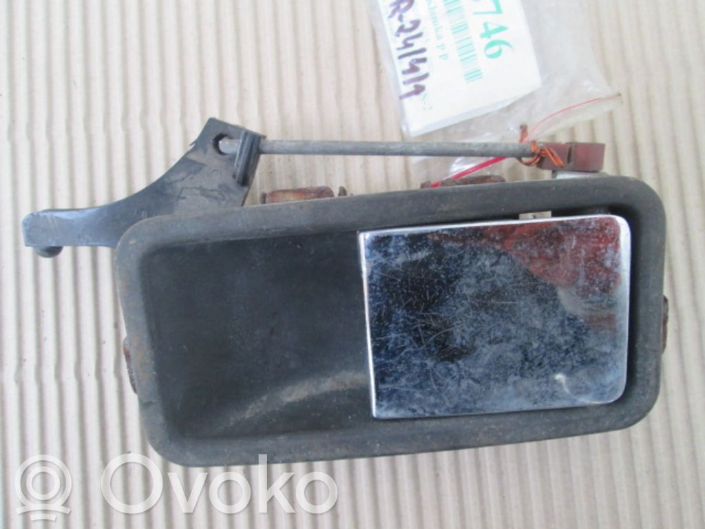 Manecilla externa puerta delantera